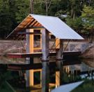 2008 Grand Award - Accessory Building, Varnville, S.C., Private PierEntrant/Architect: Robert M. Cain, Architect, Atlanta; Builder: Brunson Construction Co., Hampton, S.C.



A set of concrete steps leads from the yard down to the cantilevered dock.