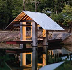 2008 Grand Award - Accessory Building, Varnville, S.C., Private PierEntrant/Architect: Robert M. Cain, Architect, Atlanta; Builder: Brunson Construction Co., Hampton, S.C.



A set of concrete steps leads from the yard down to the cantilevered dock.