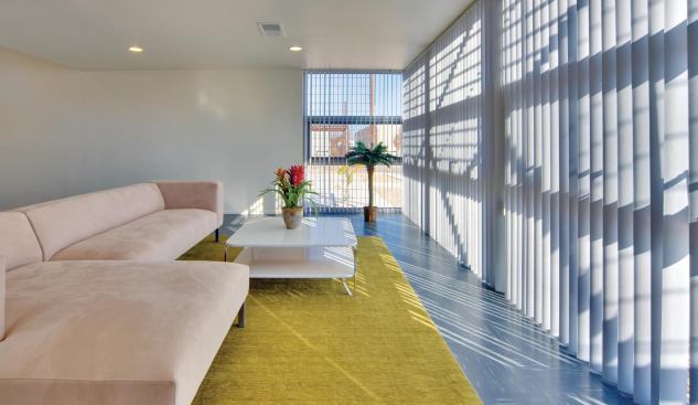 The interiors enjoy ample daylight. The concrete floors provde thermal mass.

