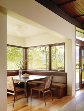 The breakfast bay looks out on a nearby pond. 

