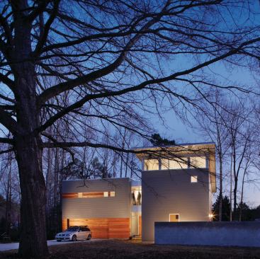 Designed and built for a young family, the Lanning residence borrowed cost-saving strategies from production homebuilders to meet a budget of $160 per square foot.

