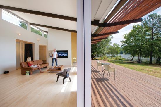 The Smart residence interior and lakefront deck.


