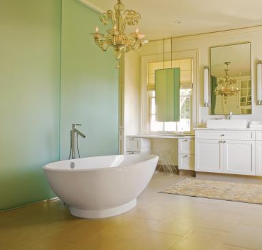 In this Seattle remodeled bath, plenty of mirrors reflect as much light as possible, and a chandelier over the tub adds a touch of glamour.