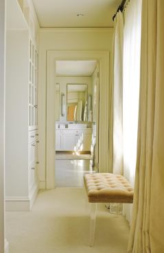 Abundant storage within and just outside the bath prevents the space from feeling cluttered.