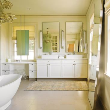 Stuart Silk Architects had the traditional moldings from the rest of the house replicated for the bath to maintain a consistency from room to room.