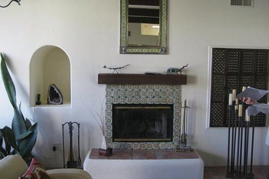 The fireplace in the existing living room.