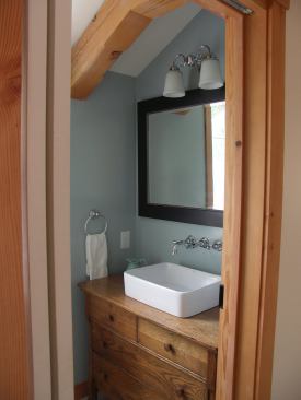 The house was rebuilt by the owners after a tree fell on their summer house. They decided to build a high-performing replica for year-round enjoyment.