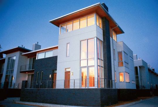 Milwaukee’s Beerline neighborhood, lined with breweries in the 1950s, is enjoying a renaissance. The 20 townhouses at River Homes (top) sold out before construction even began.Vetter Denk’s sculptural Booth Street Stairs (above) connect River Homes with an existing neighborhood up the hill.