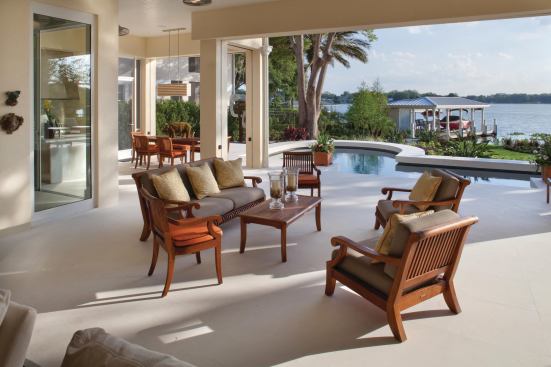 Indoor-outdoor living is a prominent feature. Hidden screens to block insects and glare can easily be lowered to keep the lanai areas comfortable year-round.