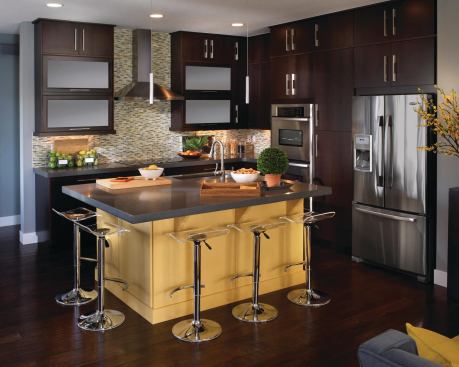 The kitchen is sleek but cozy and efficient, with enough space to gather around the cook.