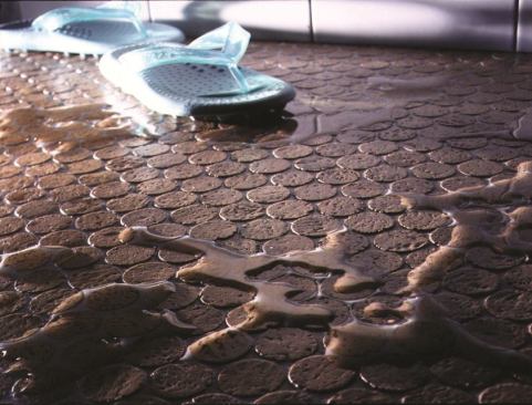 #4 Sustainable Flooring Showercork Flooring Showercork flooring is made with ¼-inch pieces of cork cut from post-industrial wine corks. The durable material is suitable for wet applications such as shower floors and pool surrounds, is slip resistant, comes prefinished or unfinished, and offers thermal and acoustical properties. The sheets, which come 12 inches by 24 inches, are adhered with thinset or glue and then grouted. 303.544.6076.
www.sustainableflooring.com.