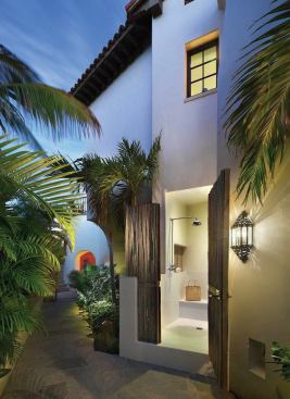 An outdoor shower is tucked off the main area.