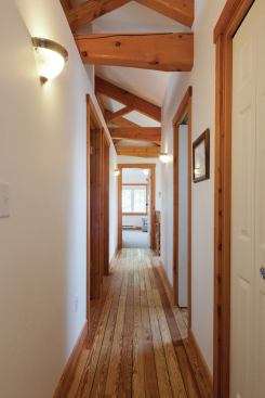 Insulated concrete forms (ICFs), and heavy timber framing work in tandem with the panels. 