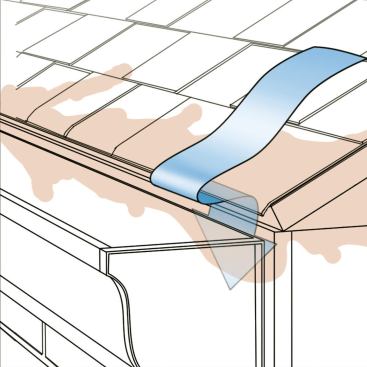 Wicking Back

Without a drip edge and a slight overhang, rainwater runoff and snowmelt can seep (or wick) back underneath the edges of the roof shingles and the roof decking, as well as the sidewall assembly, and behind the gutters. Lack of an overhang can also cause ice dam formation, with similar consequences.