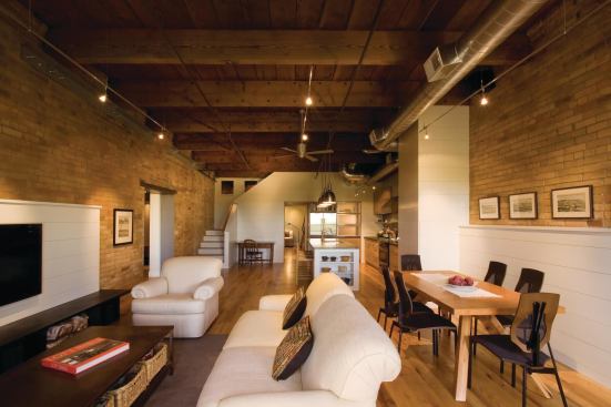 The architect exposed both the brick walls and the Douglas fir-timber roof structure. 