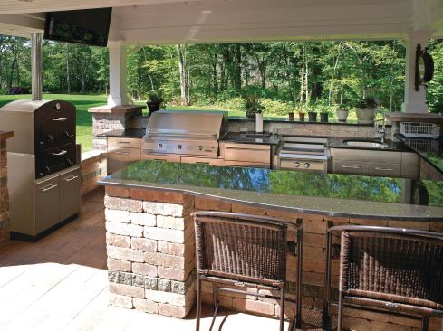 PIZZA PIZZA: Offering restaurant-style pizza at home, the Wood-Fired Oven has two shelves, a wood-burning chamber, and temperature controls. It heats up in just 15 to 20 minutes. Constructed from pure solid steel, stainless steel, and fire brick, the oven is available in two sizes. Danver. 888-441-0537. www.danver.com. Booth no. W101.