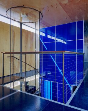 The suspended steel spiral stair and the blue polycarbonate panels are just two of the products Bercy Chen used in their exploration of interesting materials on this house.