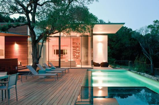 Placed to take advantage of prevailing winds, the pool creates an evaporative cooling effect for the deck and adjacent living areas.