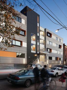 Designed as student housing, The Modules includes a green roof and a bicycle garage.