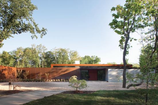 Perforated, cold-rolled steel panels add a delicate touch to Heavy Metal, a custom home in Joplin, Mo.