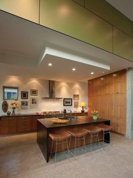 Just beyond the entry is the kitchen, which opens onto the living room. 