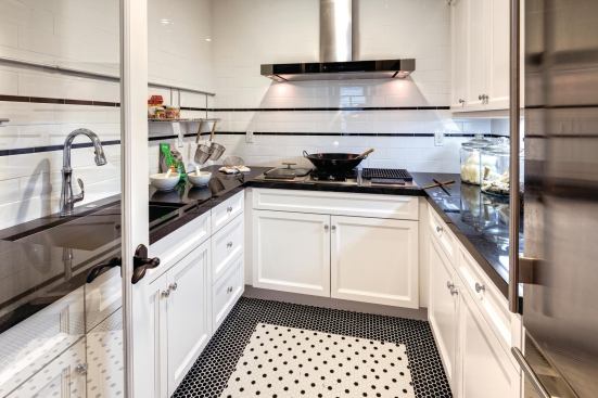 A wok kitchen contains cooking aromas and functions as a pantry.