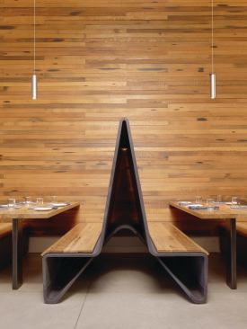 Part of the 355 11th Street mixed-use renovation, Bar Agricole blends reclaimed oak with steel and concrete for a rustic modern effect.  