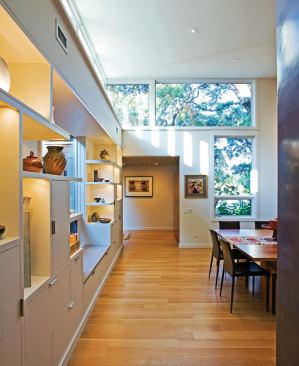 Built-in shelves provide display space for the owners’ art collection while eliminating the need for bulky bookcases, preserving the design’s clean, contemporary feel. Project: Hacienda Ja Ja, Alamo Heights, Texas; Builder: Traux Construction, San Antonio; Architect: Lake|Flato Architects, San Antonio