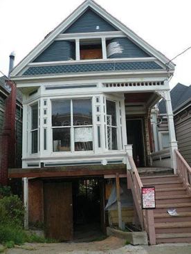 The front façade. The house had already been partially remodeled and abandoned when Feldman was hired. It was, he says, “an interesting puzzle,” to decide what to keep and what to demolish. 
