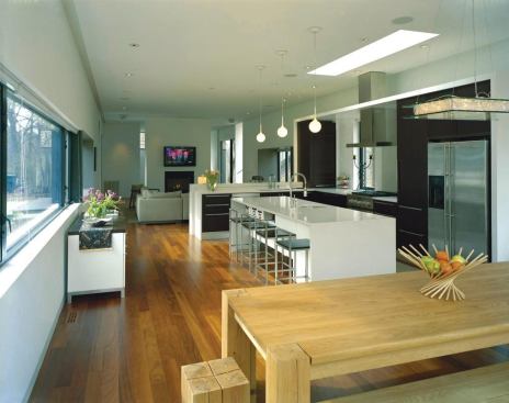 The family room and kitchen, which features wenge cabinets and quartz counters.

