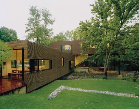 Blackwell's linear two-part design cleverly traverses a stream bed.