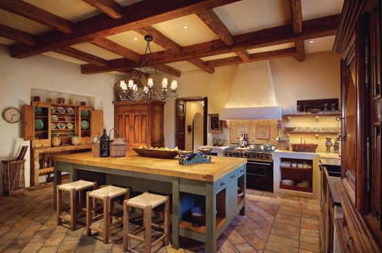 Antique terra cotta tiles cover the kitchen floor.

Architect: OZ Architects, Scottsdale, Ariz.; 

Interior designer: Karen Rapp Interiors, Phoenix

