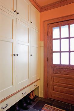 The back entry to the renovated kitchen includes a mudroom with plenty of storage. 