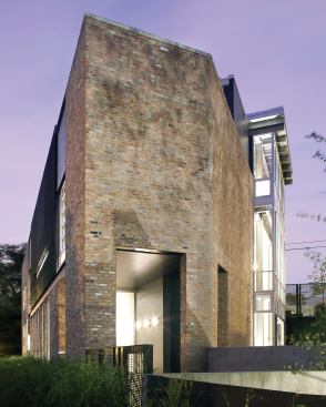 The triangular-shaped form posed challenges, but the design team transformed it into a home for a family of four in Chicago’s Bucktown neighborhood. 