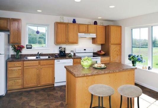 Appliances are EnergyStar, and the home is lit by daylight and by compact fluorescents and LEDs.