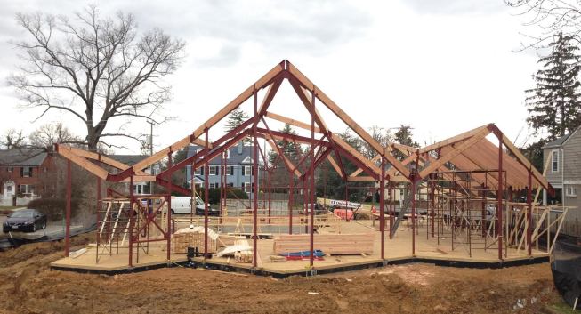 The firm designed this residence of stone and glass, which is currently under construction in Alexandria, Va.