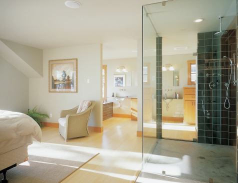 Ceiling fixtures above the bathtub and shower keep the water flowing from above.