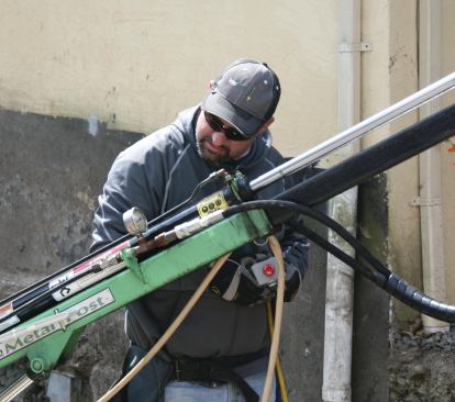 A pier’s bearing capacity usually relates to the torque required to drive it. A gauge on the machine measures the hydraulic pressure, which correlates to the torque.