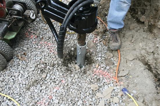 ven though this pier penetrates about 13 feet into the ground, there’s no pile of excavated soil as there would be with a conventional footing.