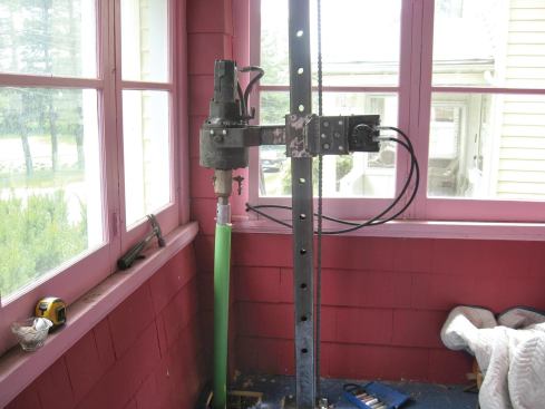 When the machine won’t fit into a tight area, the drive head can be mounted on a portable bracket that bolts to the structure.