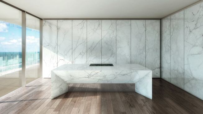 The units' kitchens are outfitted in Calacatta marble.