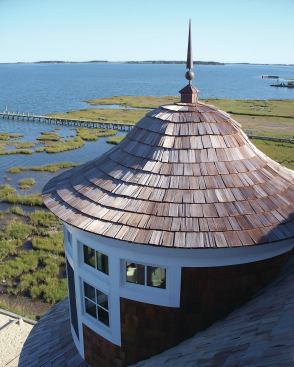 Windows on the home's circular towers afford sweeping views.