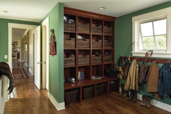 Ideas built into the floor plan have staying power, like a well-equipped mudroom with nice hooks to hang coats and shopping bags, a flat space to set heavy parcels, baskets and cubbies for bike helmets, baseball mitts, and cleats, and an appealing floor finish. 


Wisconsin Farmhouse, Boyceville, Wis.; Architect: Rehkamp Larson; Builder: Red Cedar Construction, Menomonie, Wis.