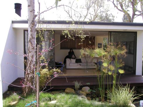 This view of the original patio illustrates the total transformation this home has experienced.