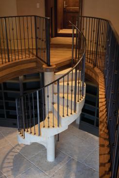Penthouse library. Escobedo Construction executed this stone spiral stair and fabricated the metal railing.

Architect: Webber Studios, Austin, Texas


