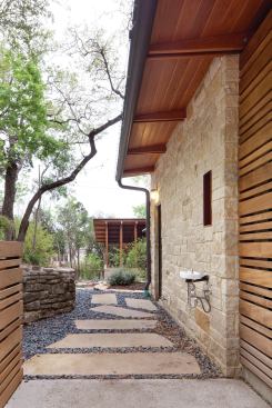 New landscape walls reuse the stone from existing walls or boulders unearthed during excavation.

