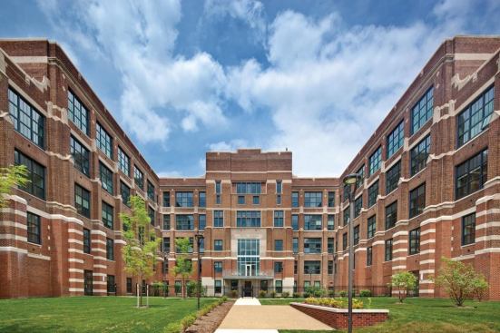 The school’s tall windows and grand volumes offered amenities rarely feasible in affordable housing.