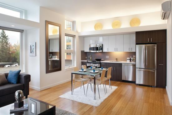 Transom windows and interior light shelves bounce sunlight deep into the units.