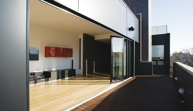 A top-floor terrace and den create another indoor-outdoor option at 1748 N. Winchester.