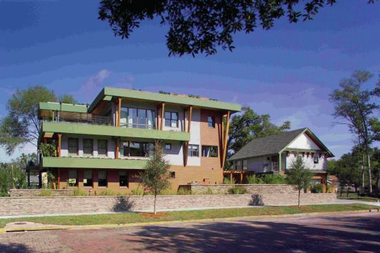 2007: Flip Side Built on a teardown site in Orlando, this house turned traditional floor planning upside-down with a home office, lounge, and guest suite downstairs and the public areas on the top floor two stories above; the master suite occupied the entire level between them. The contemporary bungalow employed an insulated precast panel structural system, including interior walls and floor platforms to enable its loftlike look and feel.